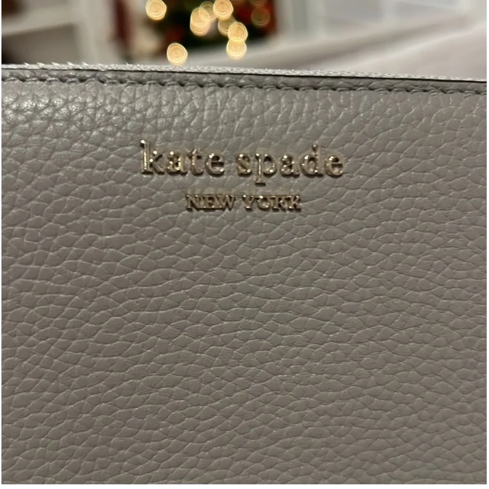 Kate spade New York zip around wallet pebbled leather